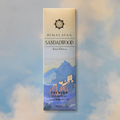 Himalayan Sandalwood incense packaging with mountain design on a soft focus background