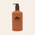 Brown bottle of Maine Beach Rangelands Vandalwood Hand & Body Wash on a beige background