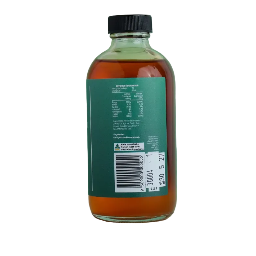 Bottle of syrup with a green label and black cap on a light green background