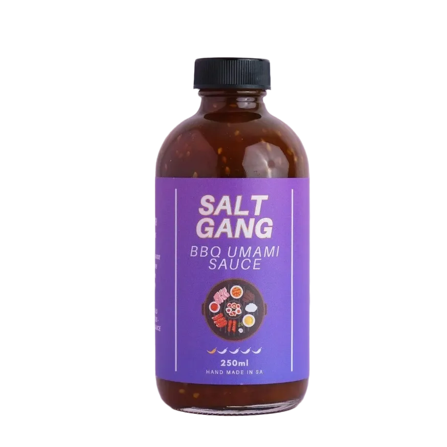Bottle of Salt Gang BBQ Umami Sauce on a light purple background