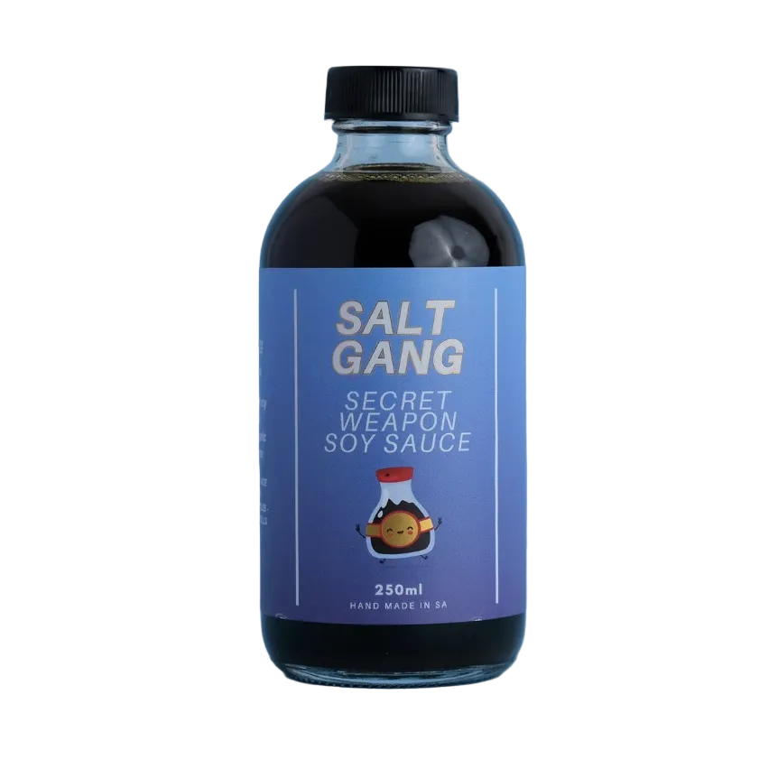 Bottle of Salt Gang Secret Weapon Soy Sauce on a blue background