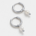 silver hoop earring with small pearl huggie