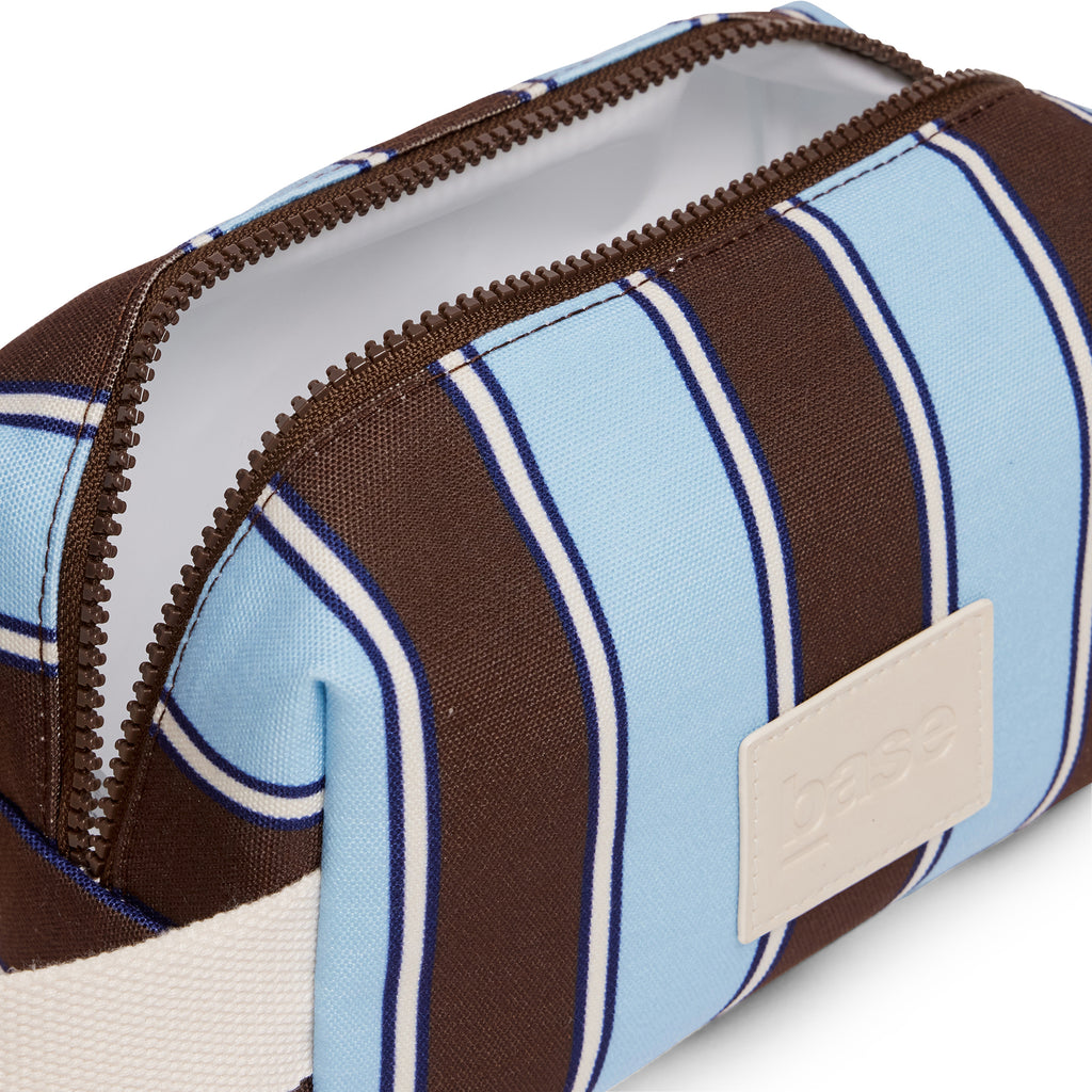 Rectangular pouch with brown, blue, and beige pattern on a white background