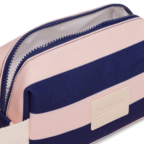 Striped pouch with navy and pink design, featuring a visible brand logo.