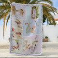 Decorative blanket with mermaid and beach scene design draped over a chair outdoors.
