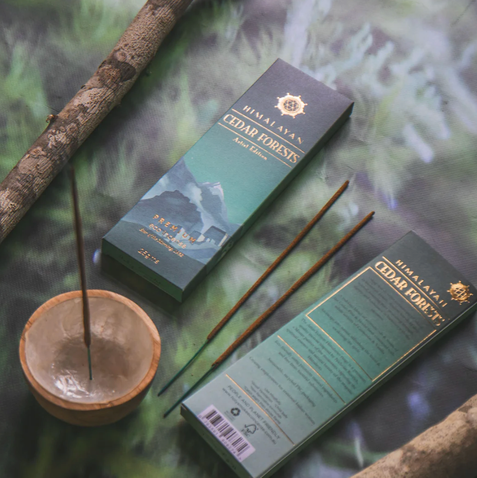 Himalayan Cedar Forest incense packaging with incense sticks on a natural background