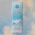 Himalayan Hina Yatra incense packaging with mountain design on a gradient background