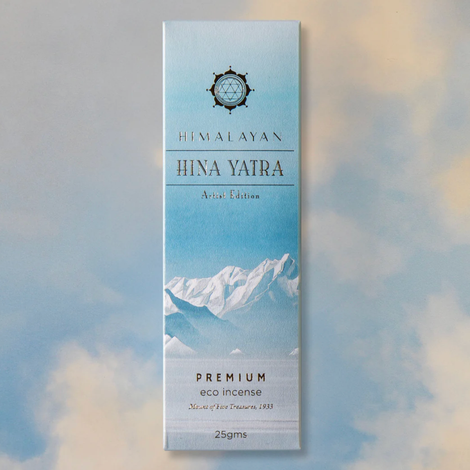 Himalayan Hina Yatra incense packaging with mountain design on a gradient background